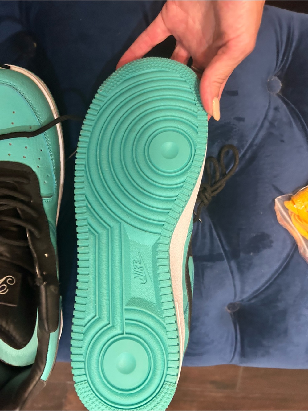 Nike Turquoise and Black Low-Top Sneakers Tiffany blue Nike shoes.